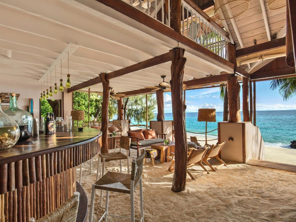 The bar with sandy floor at the Constance Tsarabanjina island resort in Madagascar