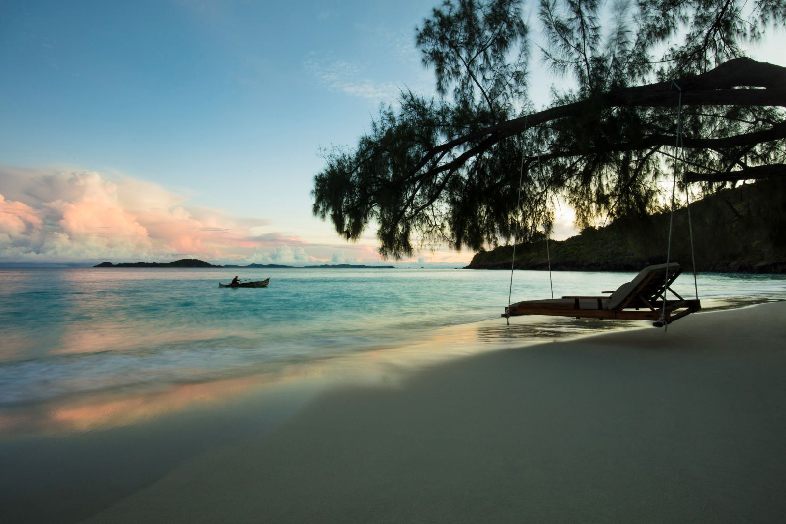 Swinging lounger on the beach at dusk at the Constance Tsarabanjina island resort in Madagascar