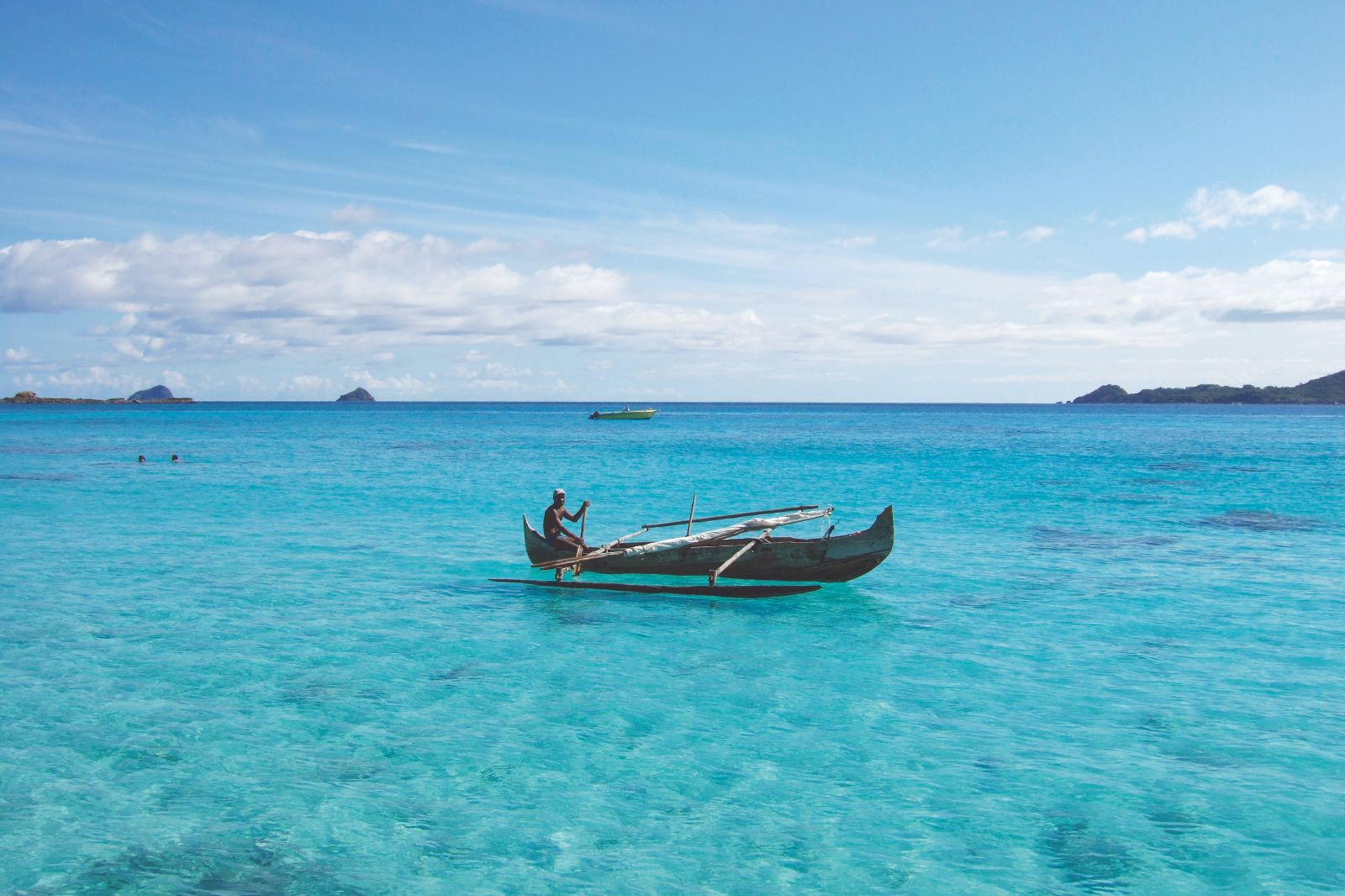 Traditional fishing boat in the waters near the Constance Tsarabanjina in Madagascar