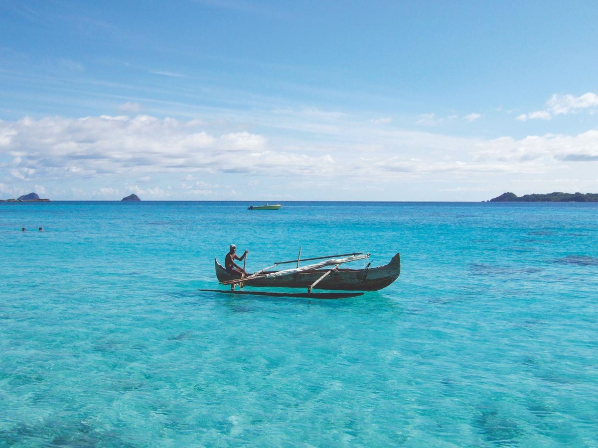 Traditional fishing boat in the waters near the Constance Tsarabanjina in Madagascar