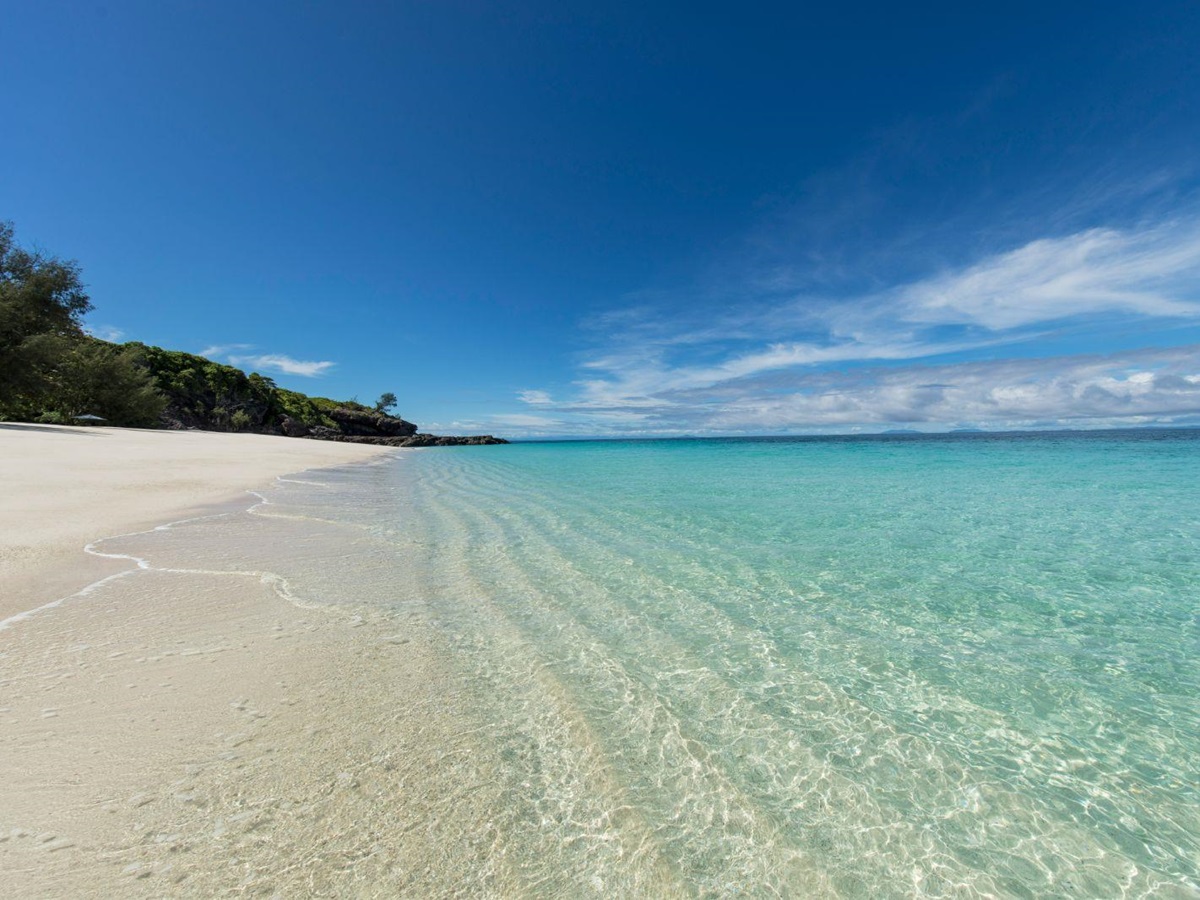Turquoise waters and white sand beach at the Constance Tsarabanjina in Madagascar