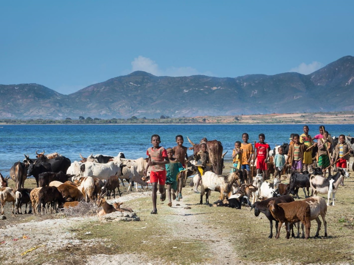 People on the banks of Lake Anony near Mandrare River Camp in Madagascar
