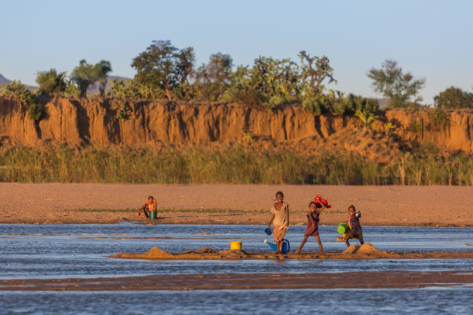 People on the river near Mandrare River Camp in Madagascar