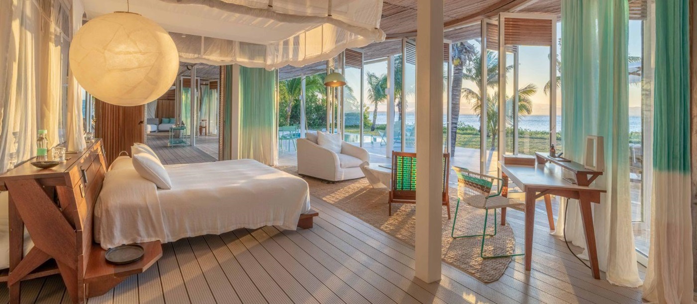 Villa bedroom at Miavana private island resort off Madagascar's north coast