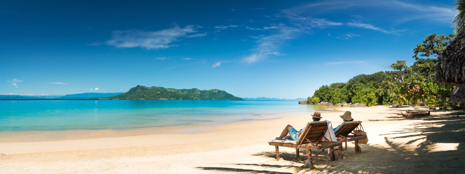Loungers on the beach at Tsara Komba in the Nosy Be archipelago in Madagascar