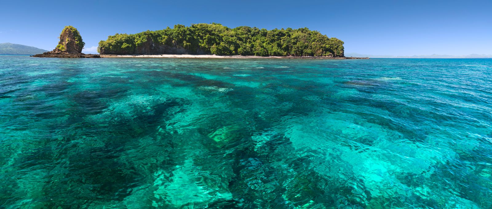 Ocean surrounding Tsara Komba in the Nosy Be archipelago in Madagascar