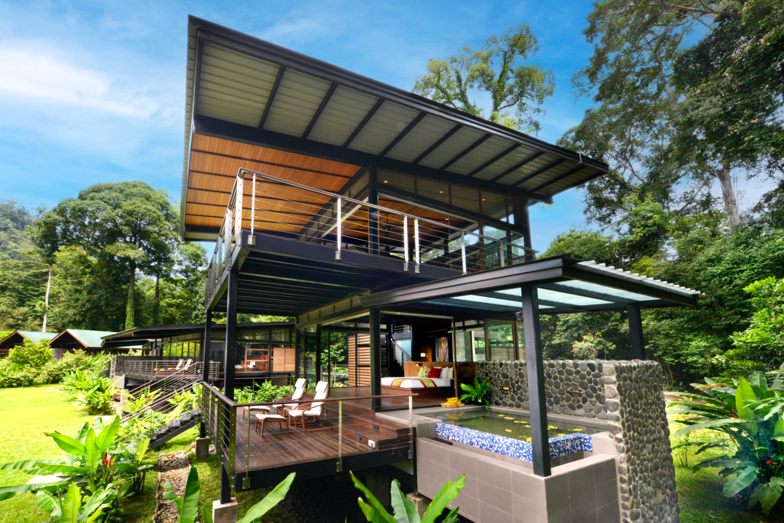 Exterior view of a double storey villa at Borneo Rainforest lodge in Malaysia's Danum Valley