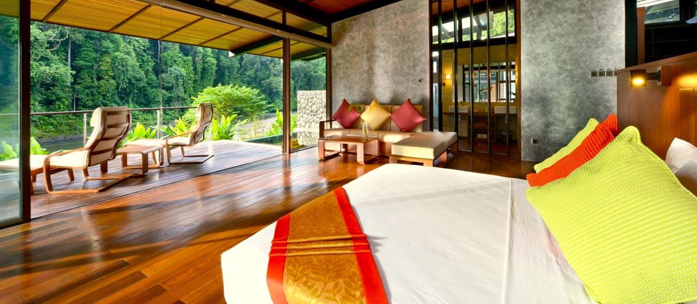 Single storey villa bedroom at Borneo Rainforest Lodge in Malaysia's Danum Valley