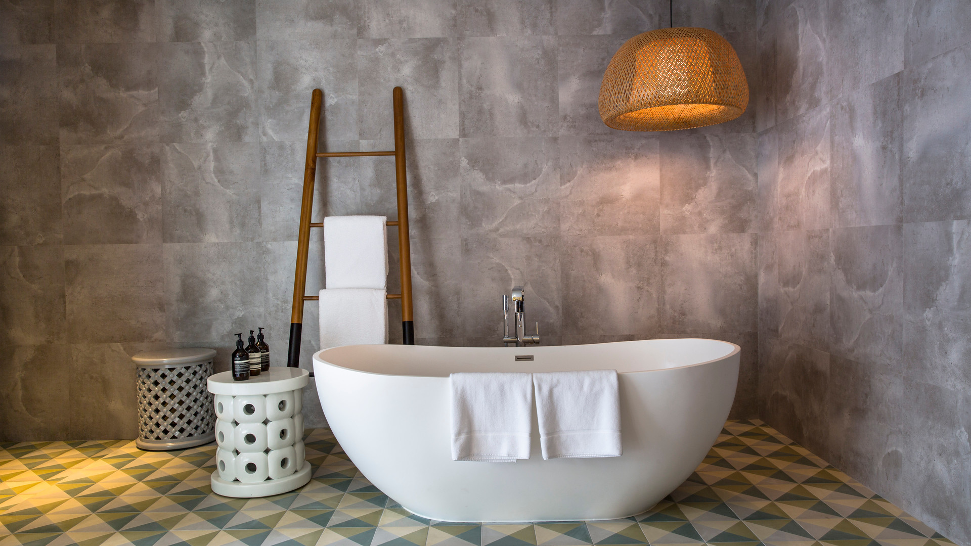 A bathroom of a beach house at Amilla Fushi