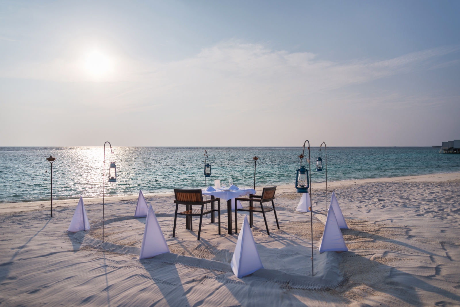 Private beach dining at luxury resort Amilla in the Maldives