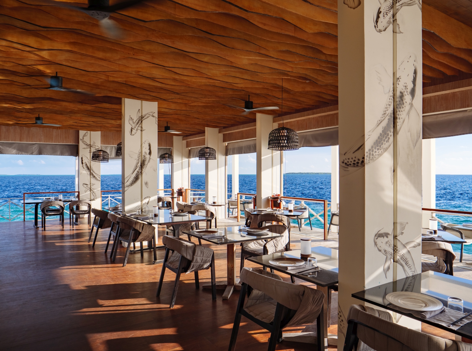 Interior of seaside Feeling Koi restaurant at luxury resort Amilla in the Maldives