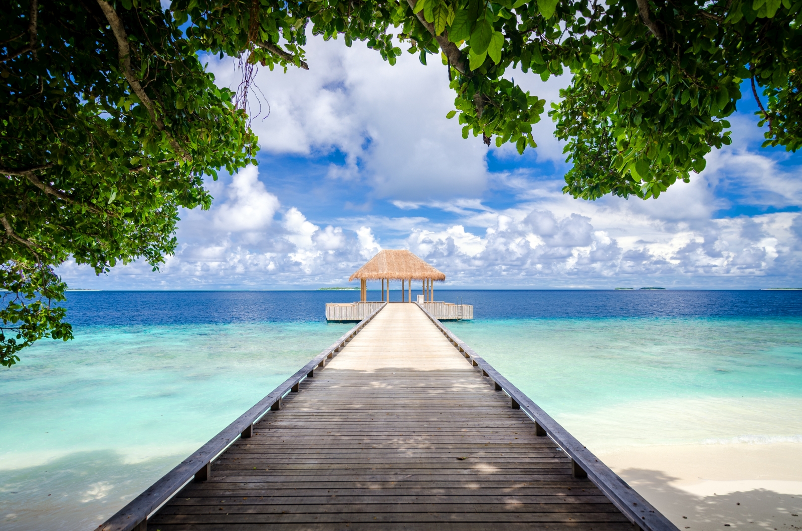 Over-water yoga pavillion at luxury resort Amilla in the Maldives