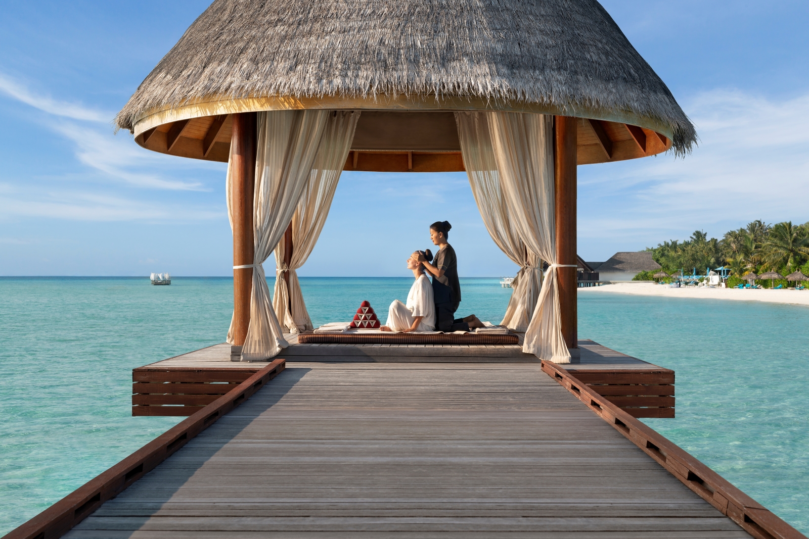 Spa treatment in an overwater treatment room at luxury resort Anantara Dhigu in the Maldives