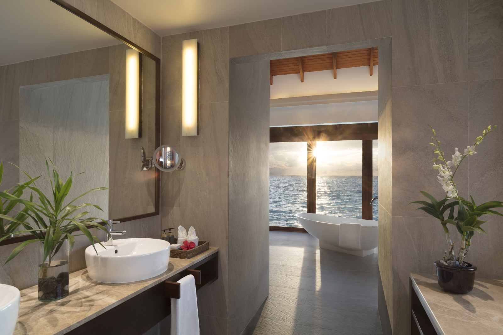 Bathroom of a sunset over water pool suite at luxury resort Anantara Dhigu in the Maldives