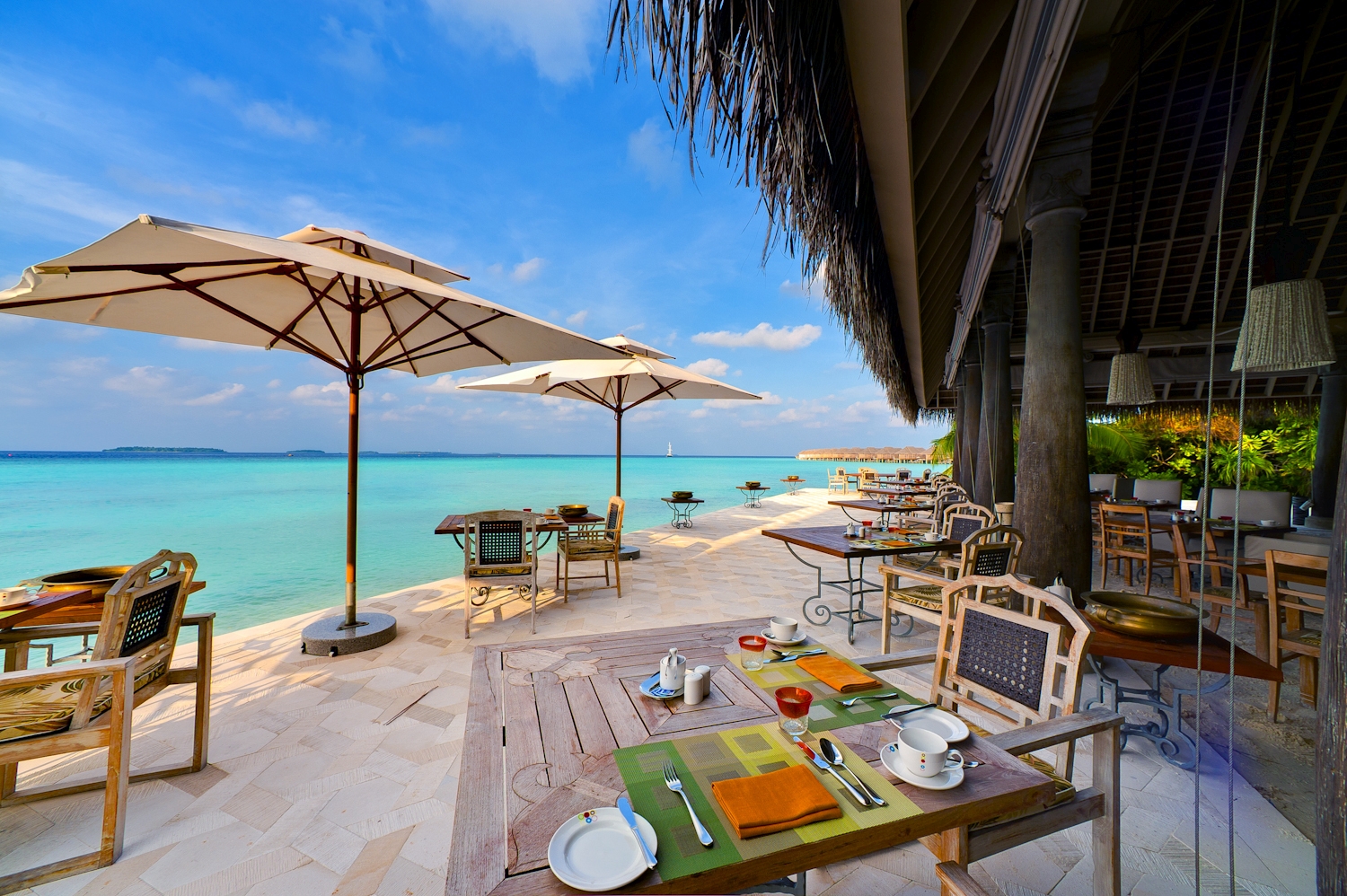 Sea-side breakfast at luxury resort Anantara Kihavah in the Maldives