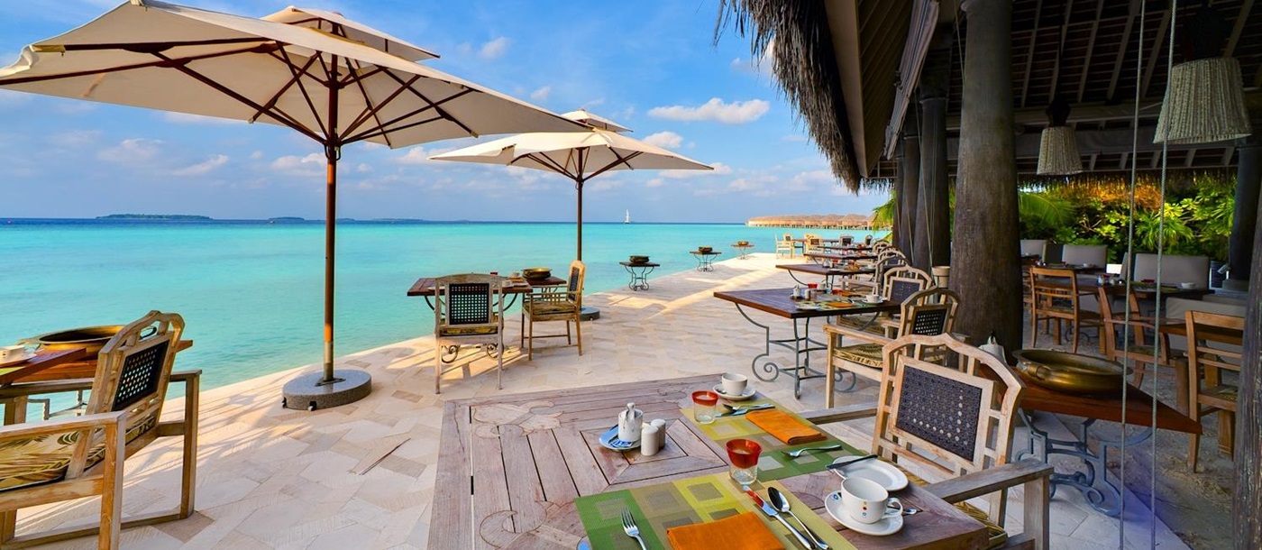 Sea-side breakfast at luxury resort Anantara Kihavah in the Maldives