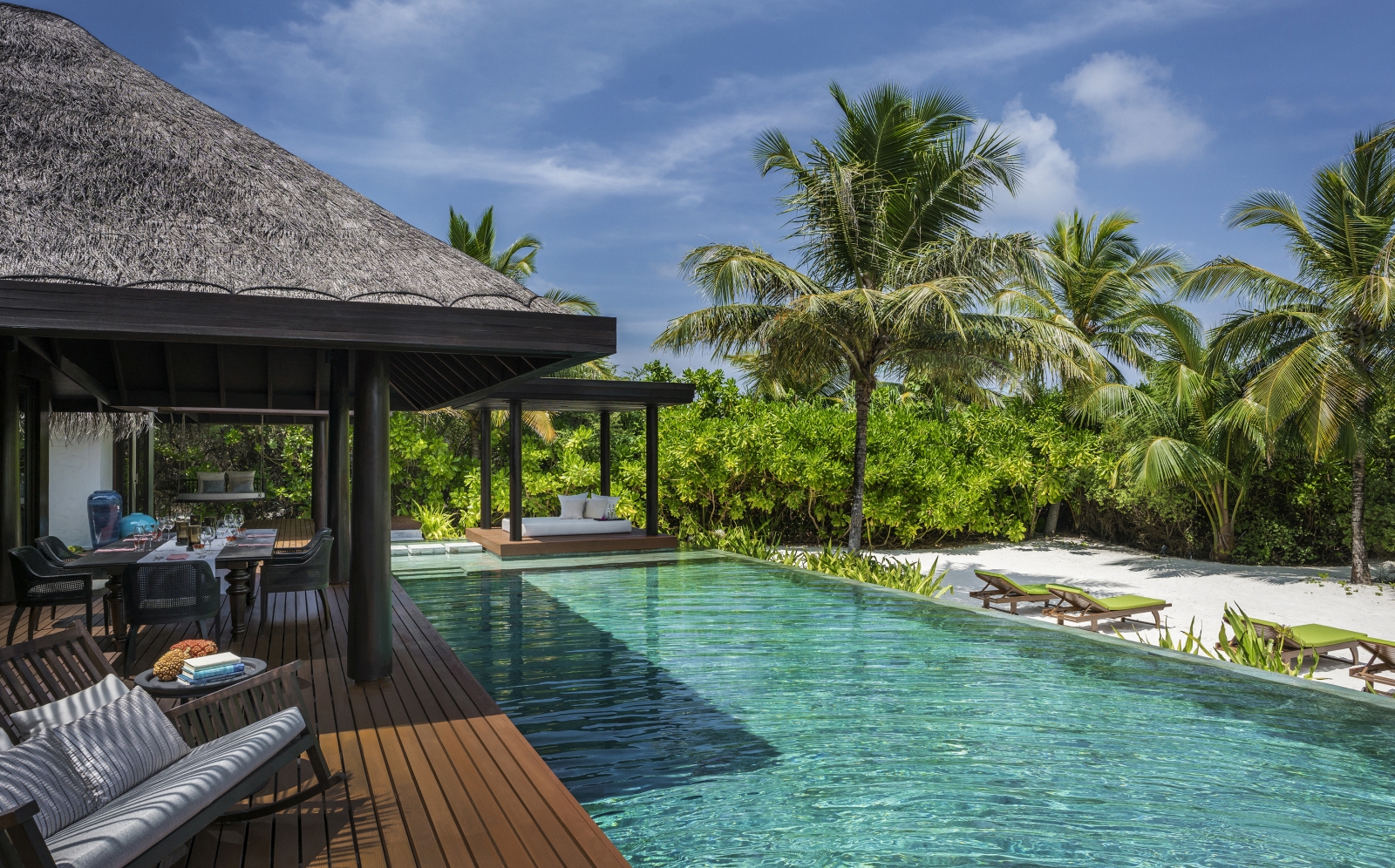 Private deck and pool of a three-bedroom Residence at luxury resort Anantara Kihavah in the Maldives