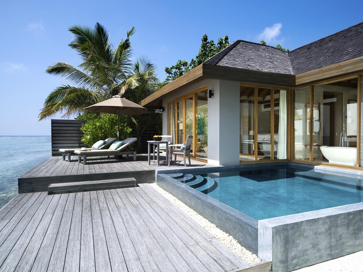 Private deck of an Ocean Pool Bungalow at luxury resort Anantara Veli in the Maldives
