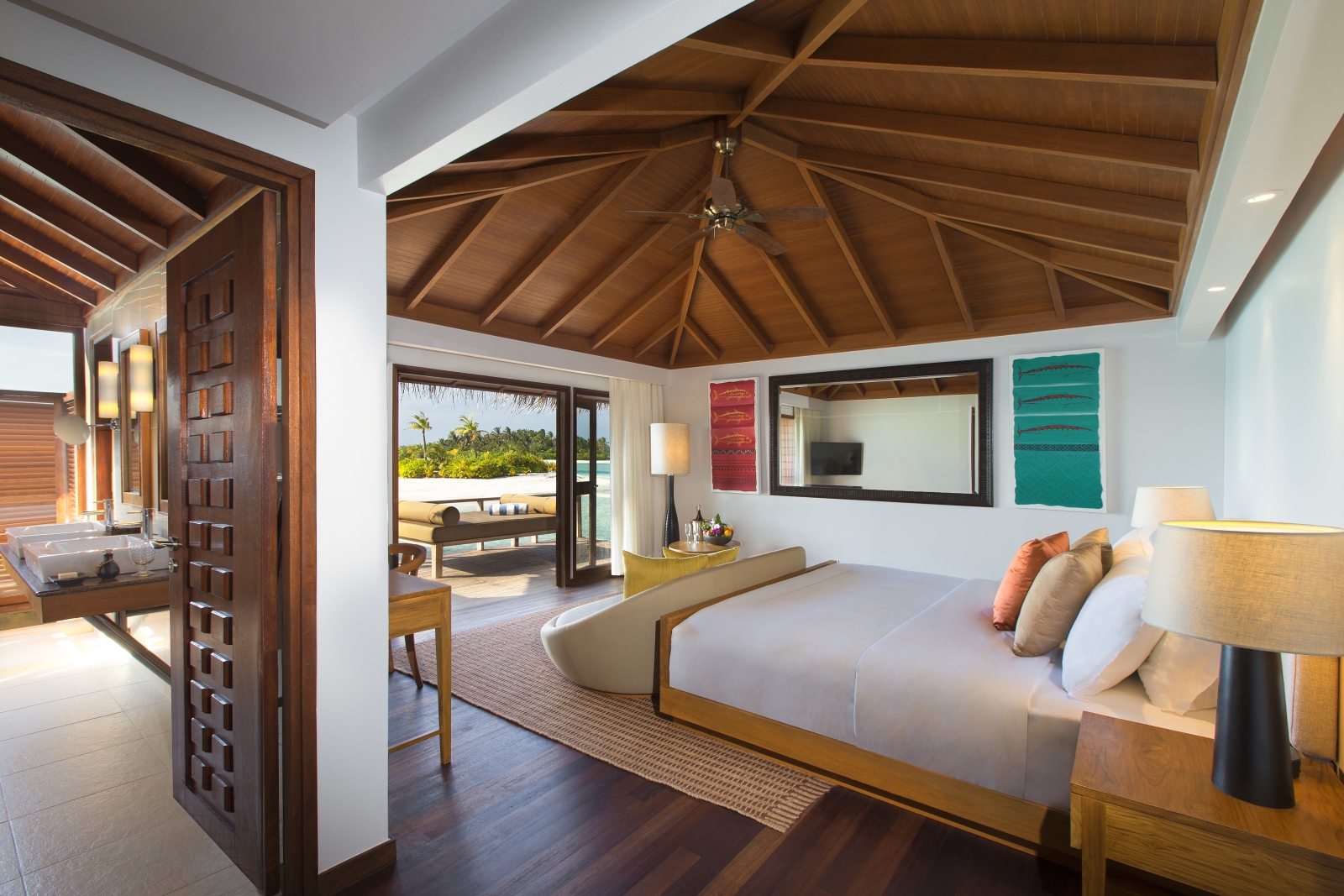 Bedroom of an Overwater Bungalow at luxury resort Anantara Veli in the Maldives