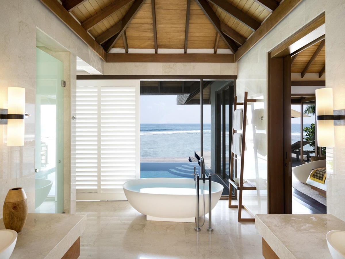 Bathroom of an Ocean Pool Bungalow with freestanding bathtub at luxury resort Anantara Veli in the Maldives