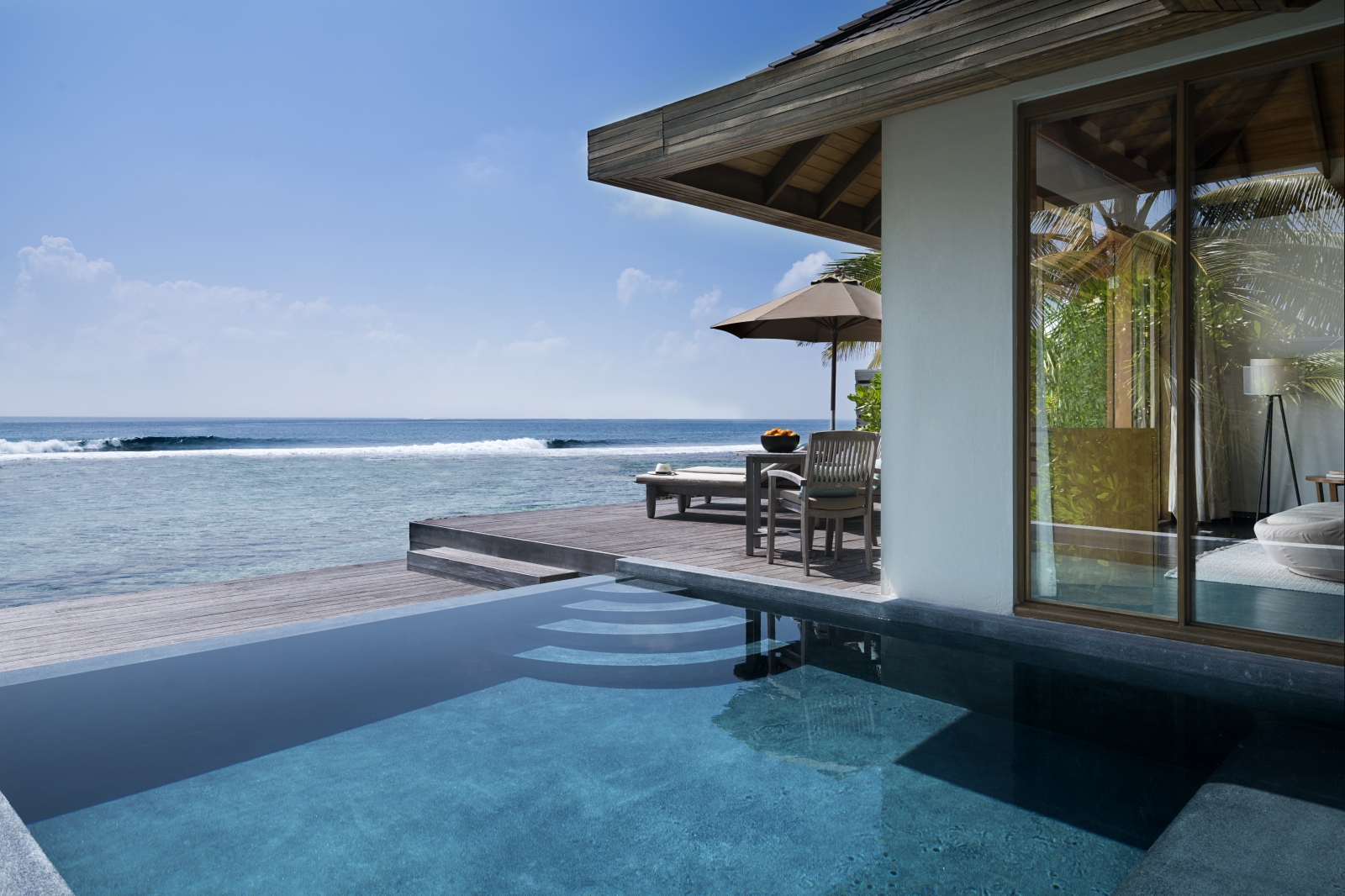 Private pool and deck of an Ocean Pool Bungalow at luxury resort Anantara Veli in the Maldives