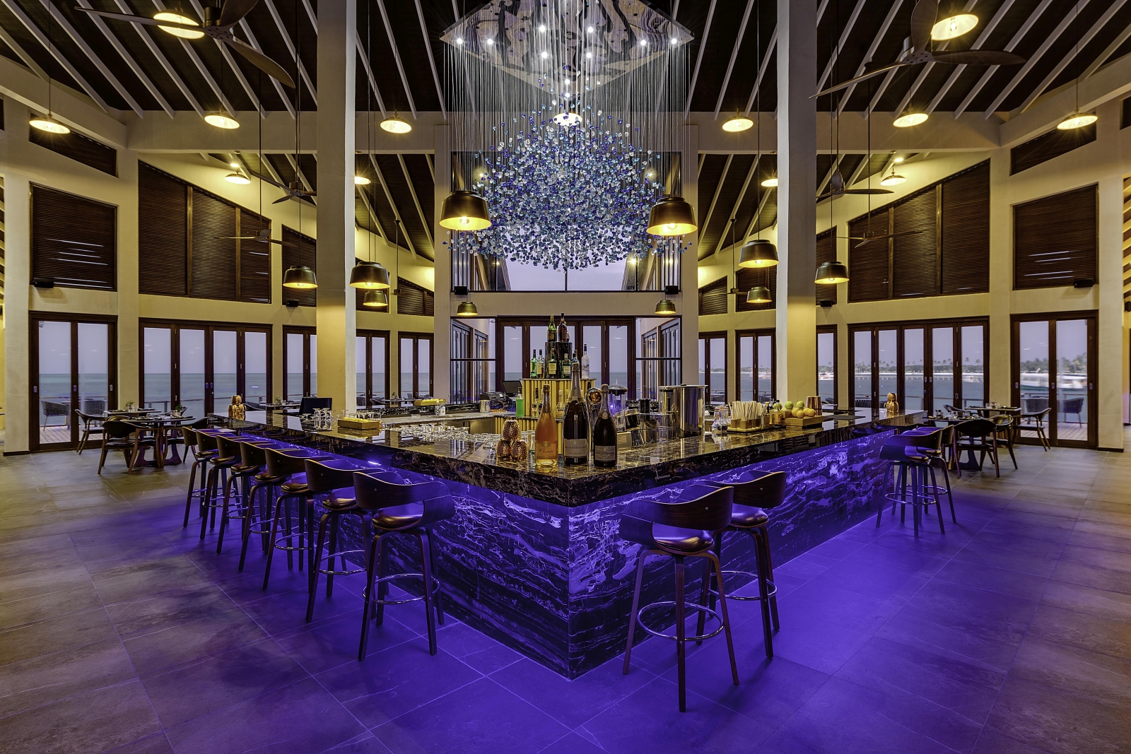 Bar at Pier Six, restaurant at luxury resort Atmosphere Kanifushi in the Maldives