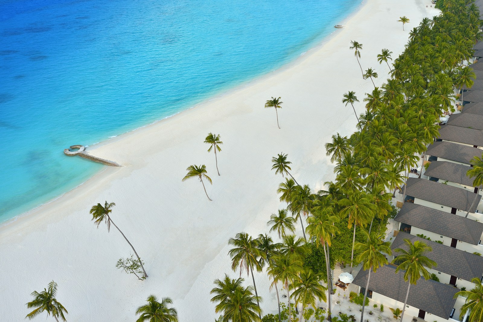 the beach and villas of Atmosphere Kanifushi, Maldives