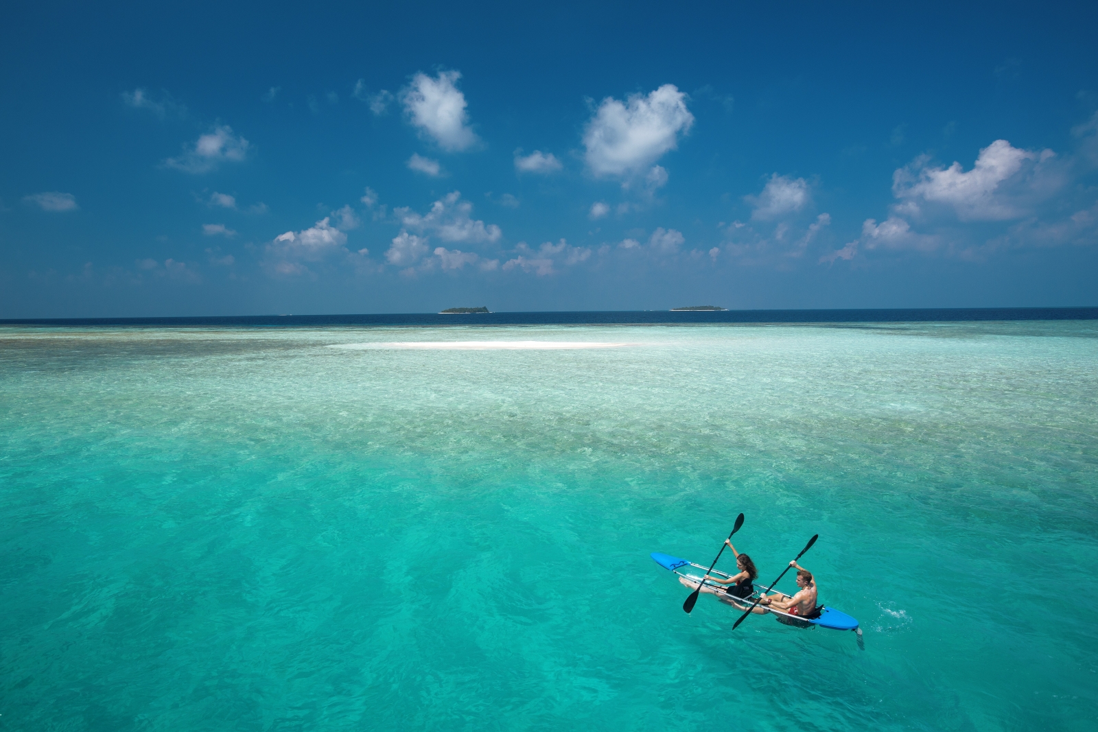 Couple kayaking at Baros