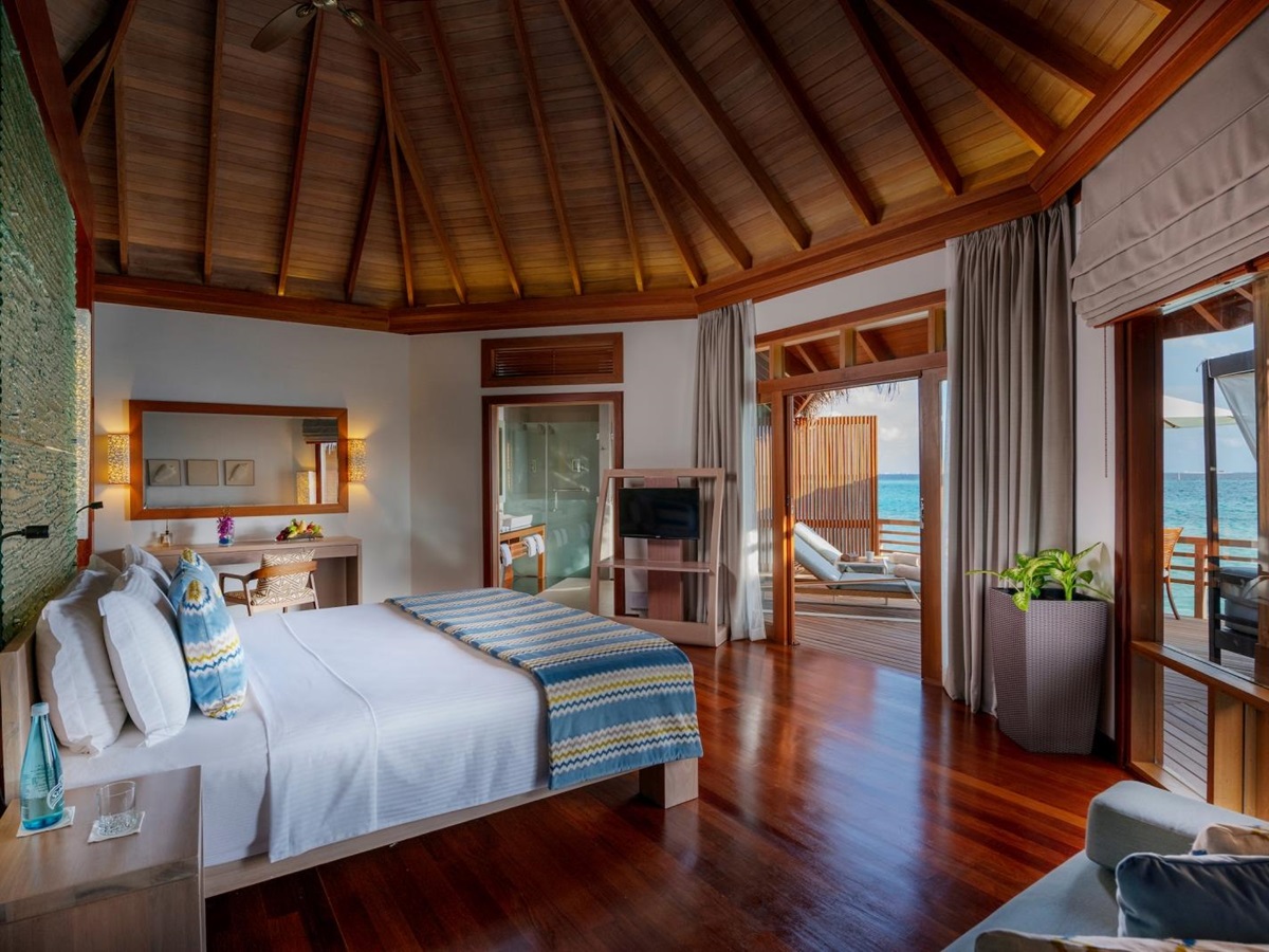 Bedroom of Water Villa at Baros
