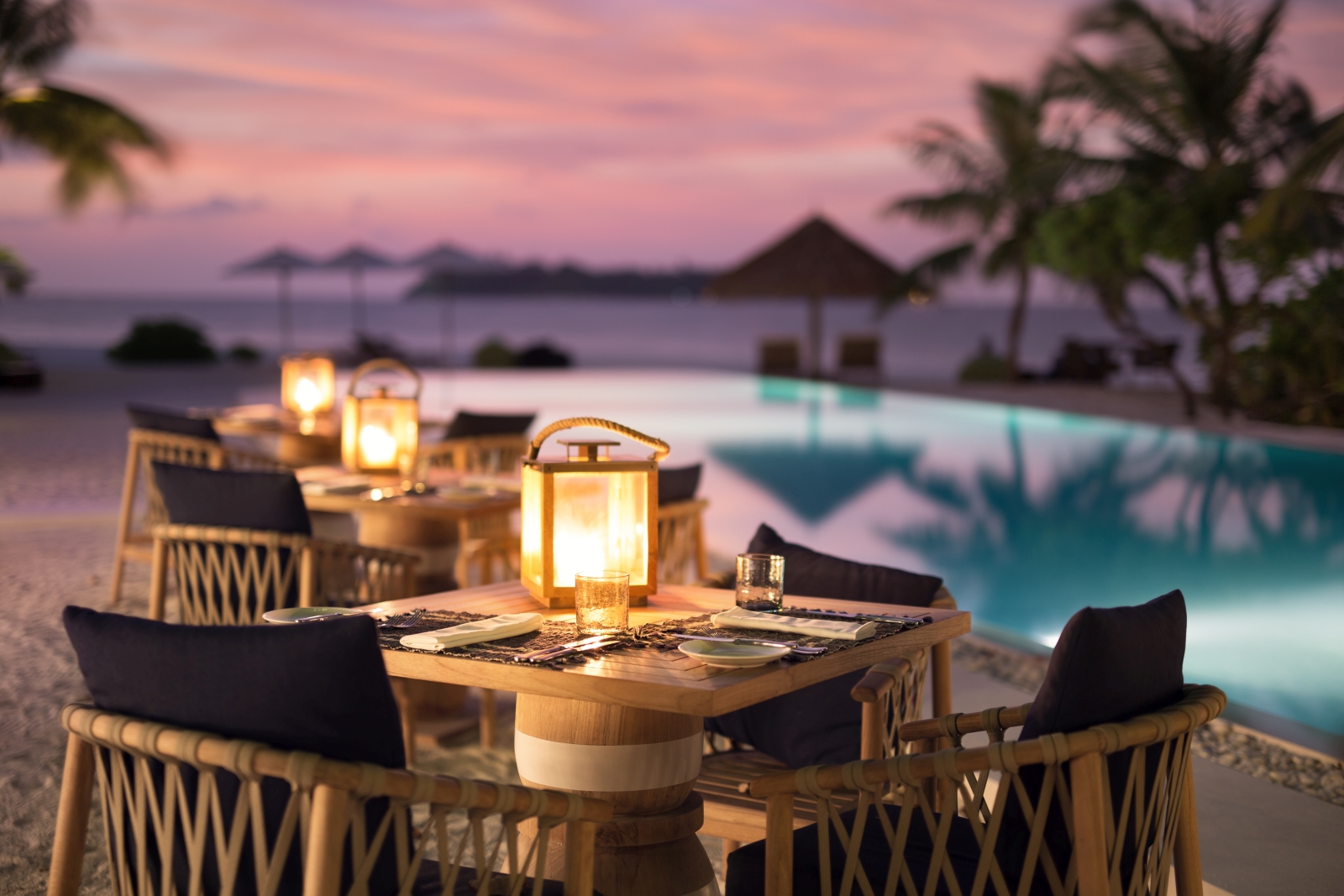 Poolside dining at Ufaa Restaurant at luxury resort Cocoa Island in the Maldives