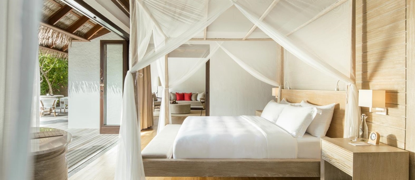 Bedroom of a Beach Villa at luxury resort COMO Maalifushi in the Maldives