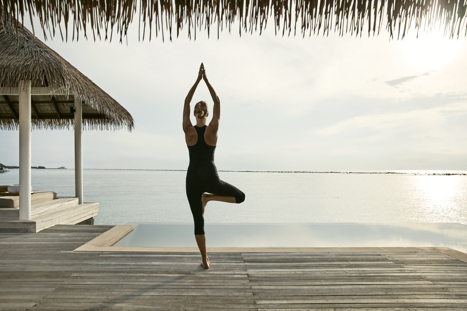 Yoga at luxury resort COMO Maalifushi in the Maldives
