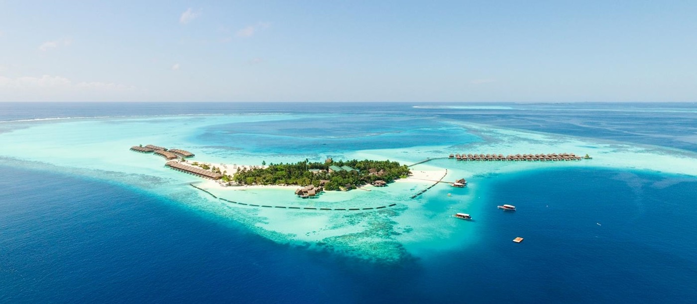 Aerial view of the island of luxury resort Constance Moofushi in the Maldives