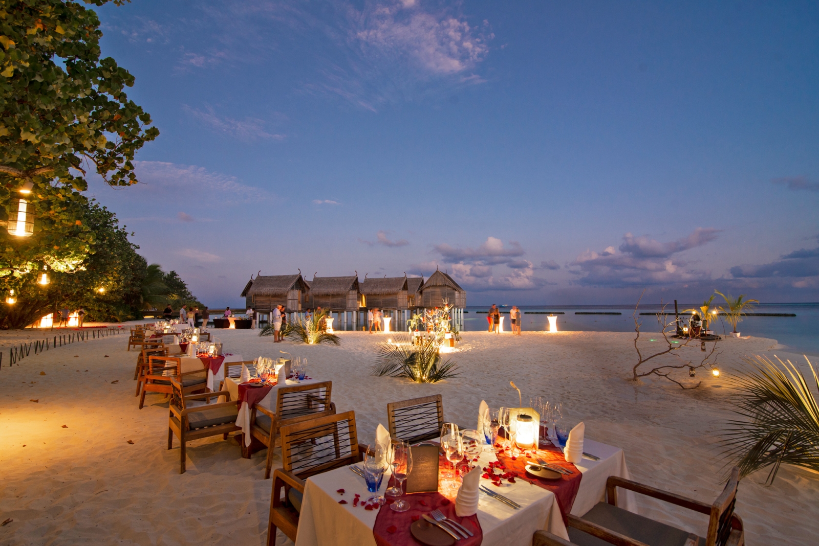 Dinner at the beach at luxury resort Constance Moofushi in the Maldives