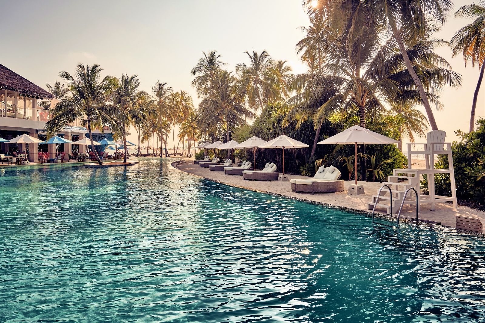 The swimming pool at Finolhu Maldives