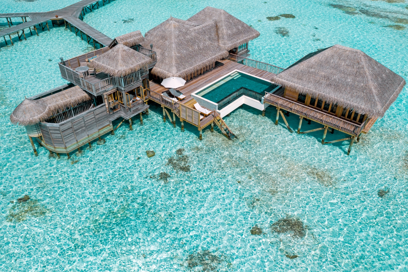 Aerial shot of a Family Villa with pool at luxury resort Gili Lankanfushi in the Maldives
