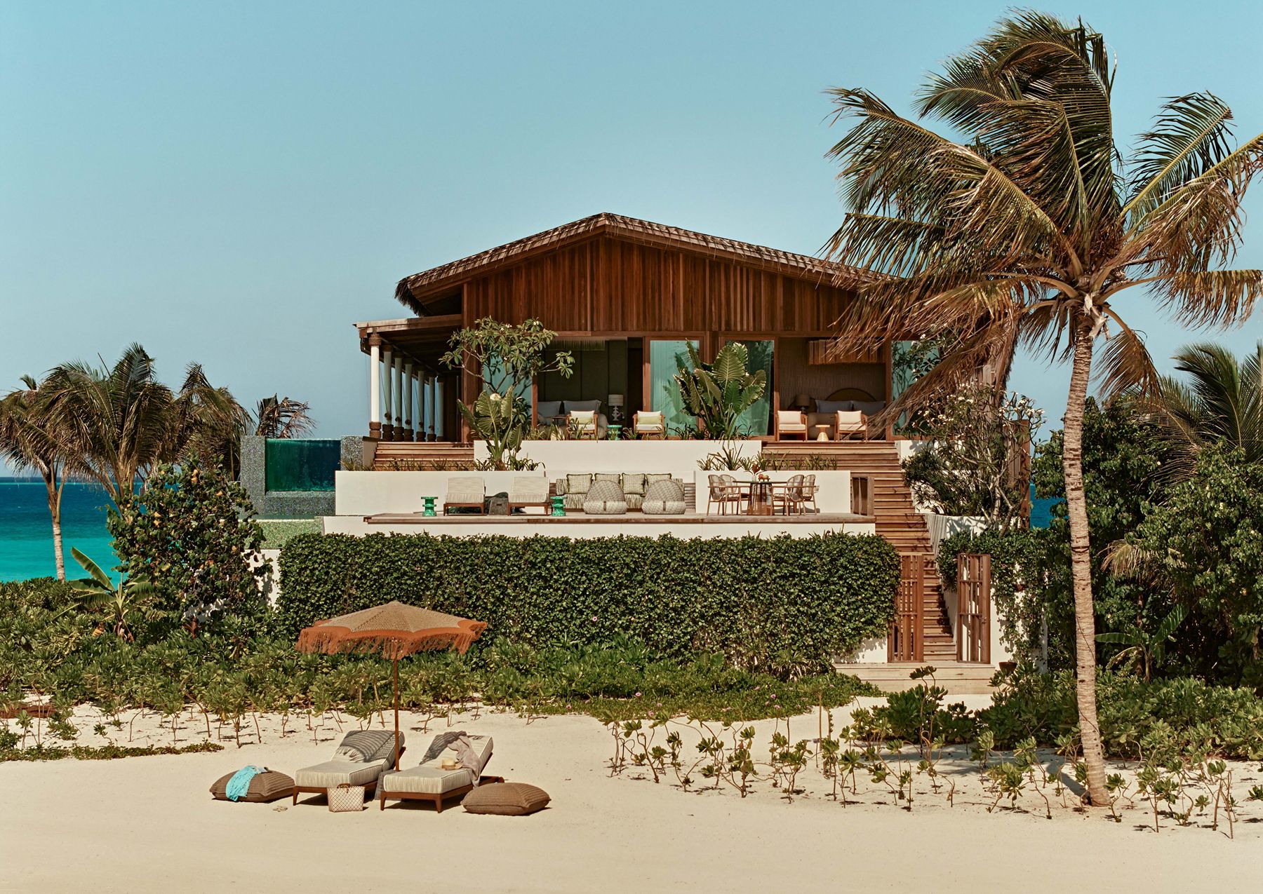 Exterior view of a beach villa at .HERE Maldives.