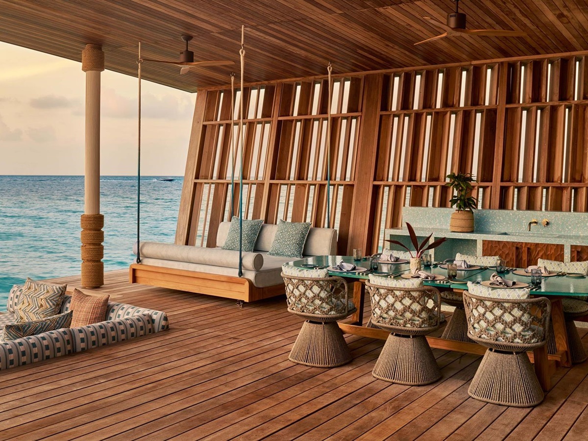 Overwater villa living area at .HERE Maldives.