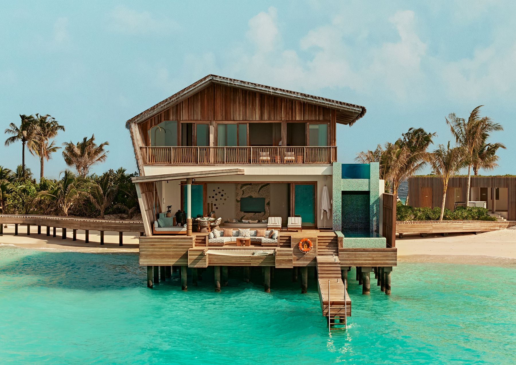 Exterior view of a water villa at .HERE Maldives.