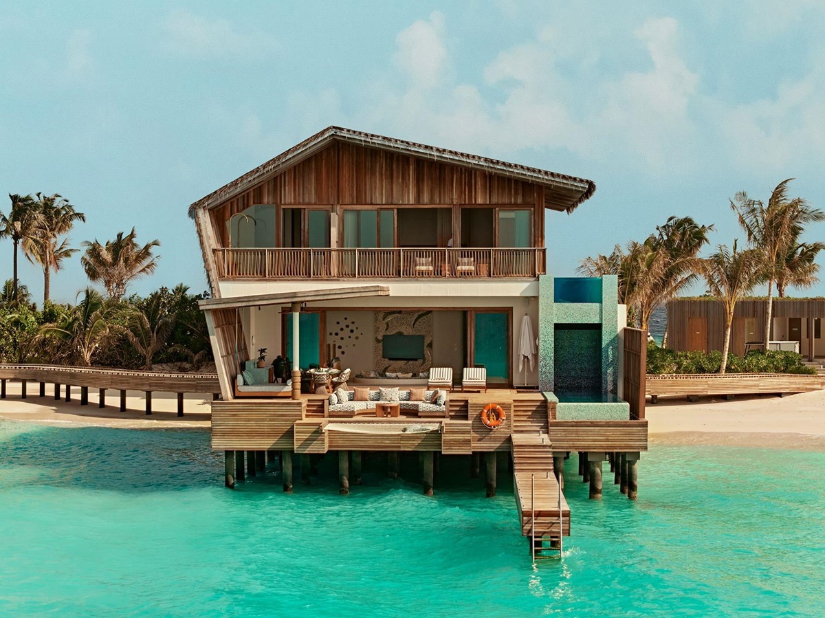 Exterior view of a water villa at .HERE Maldives.