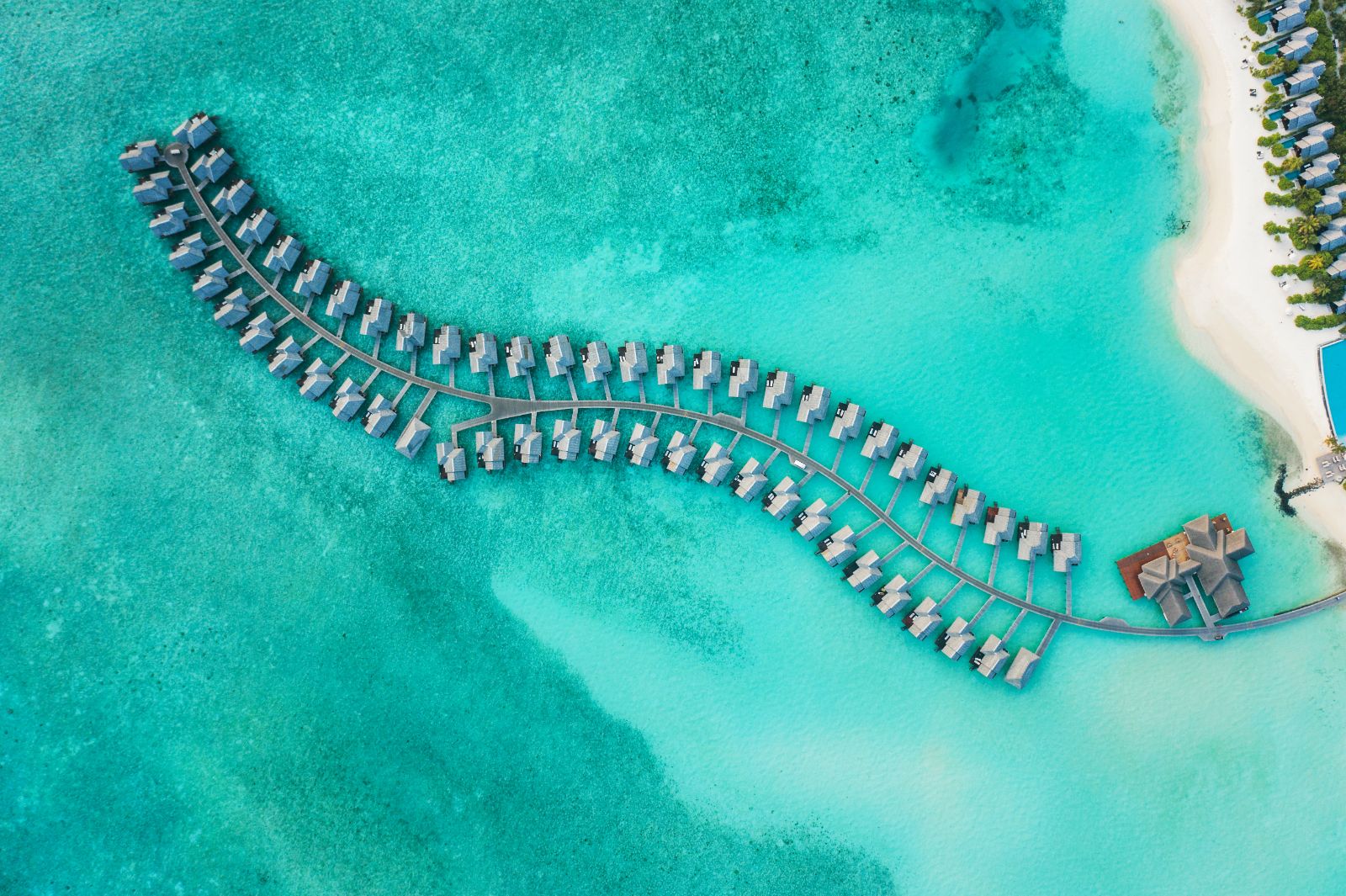 Aerial view of the over-water villas at Heritance Aarah resort in the Maldives