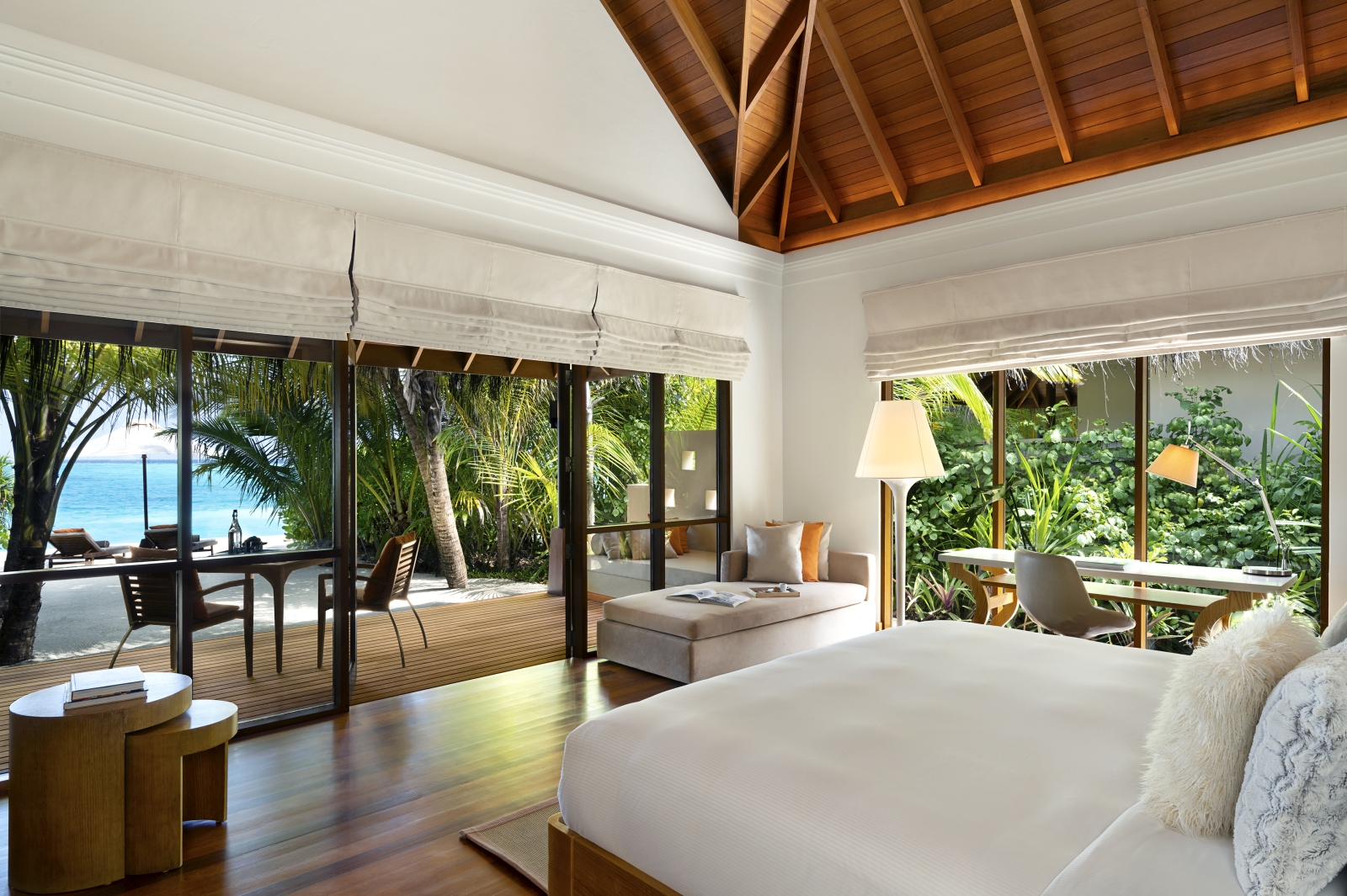 Bedroom of a Beach Bungalow at luxury resort Huvafen Fushi in the Maldives