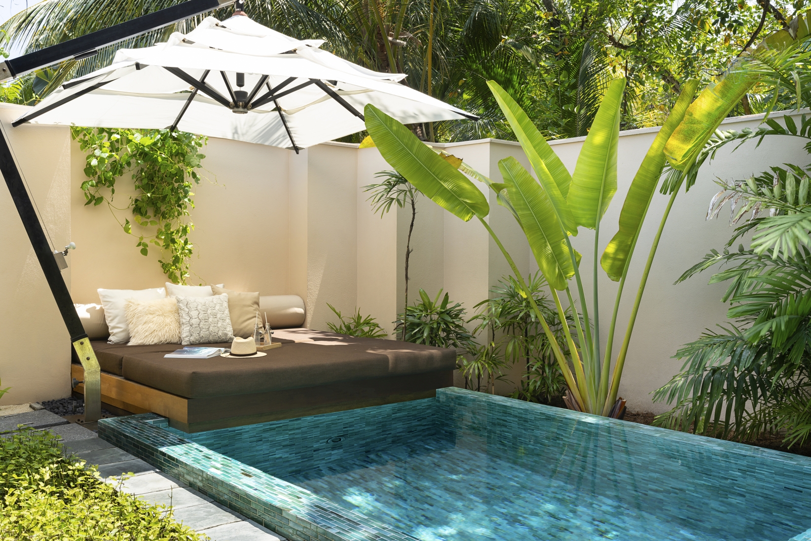 Private pool and pool cabana of a Beach Bungalow at luxury resort Huvafen Fushi in the Maldives