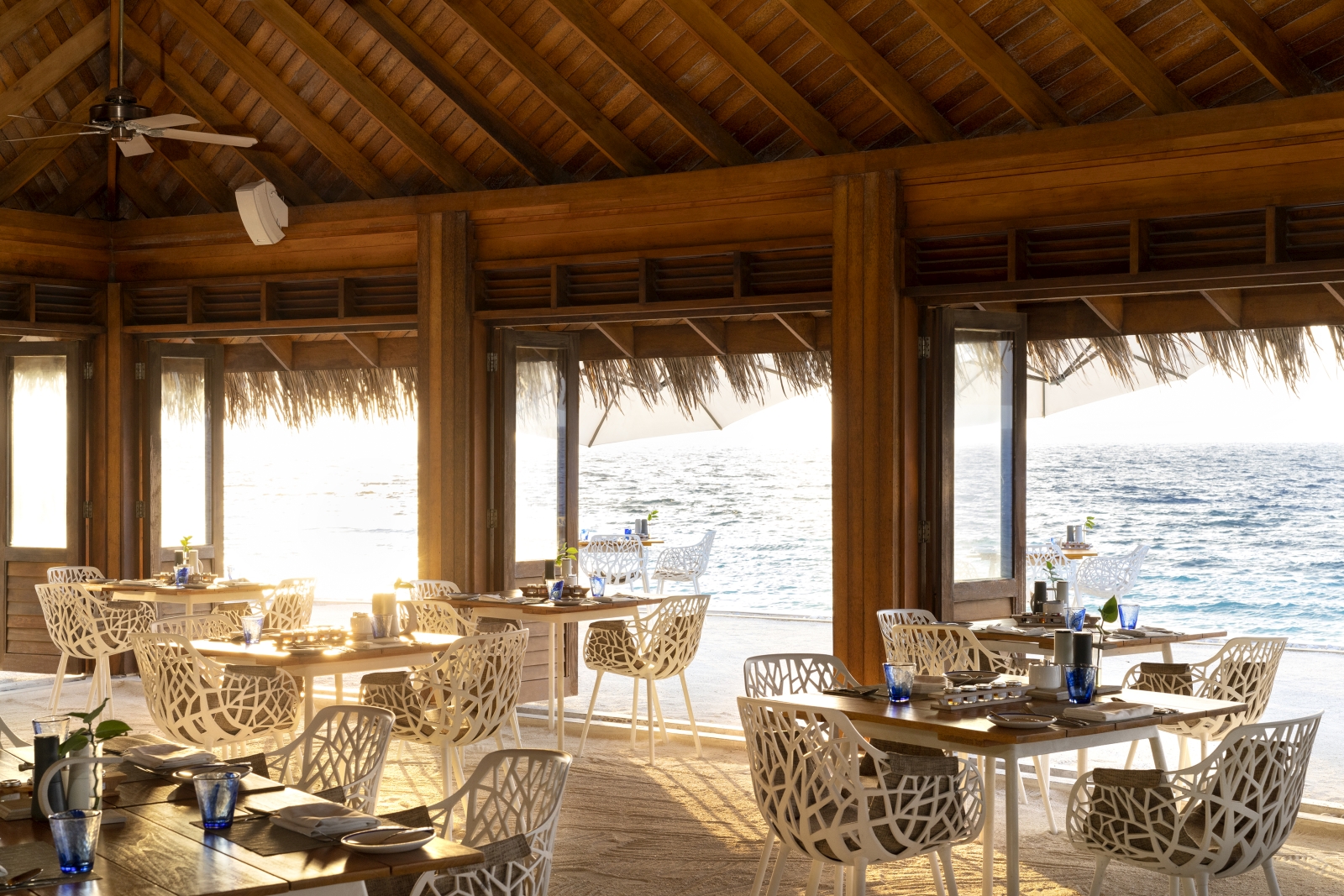 Sea-side dining at Celsius Restaurant at luxury resort Huvafen Fushi in the Maldives