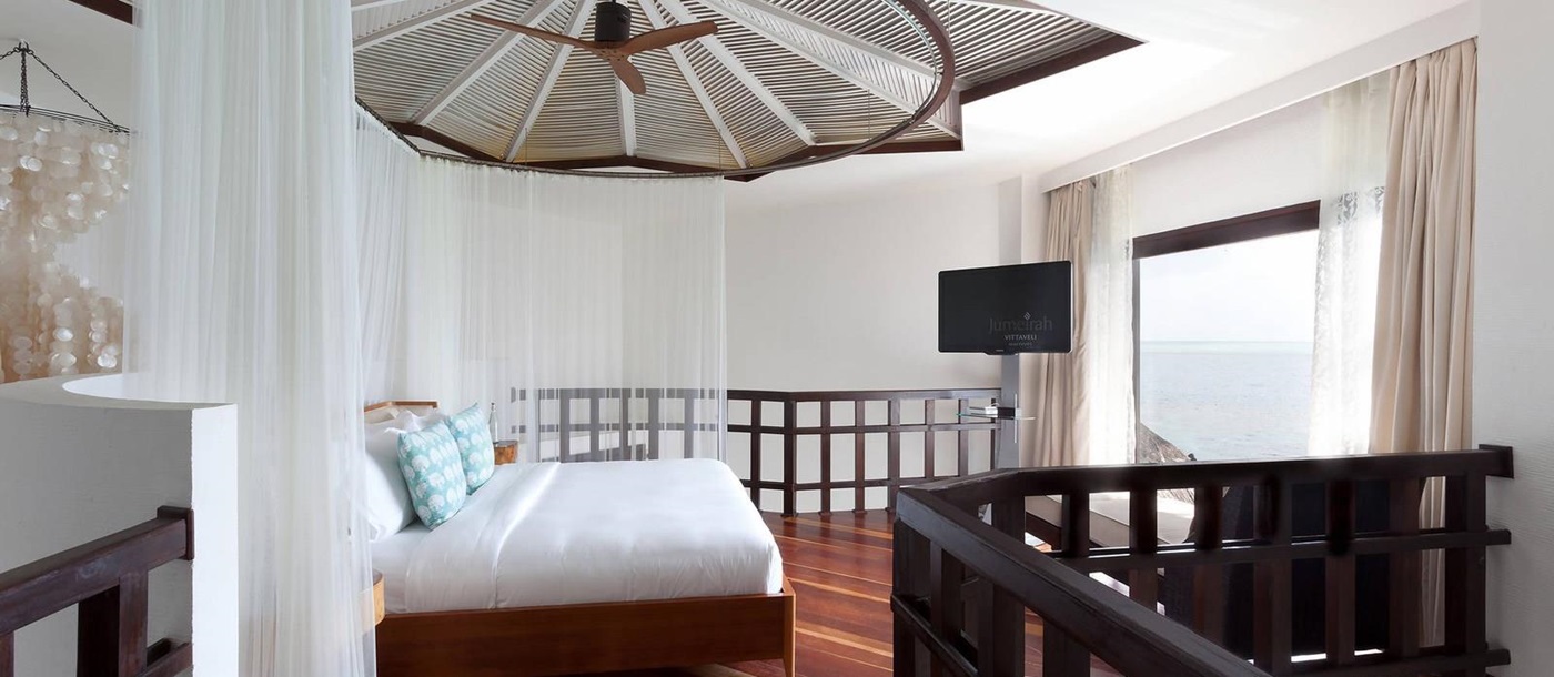 Double bedroom of an ocean suite at Jumeirah Vittaveli, Maldives