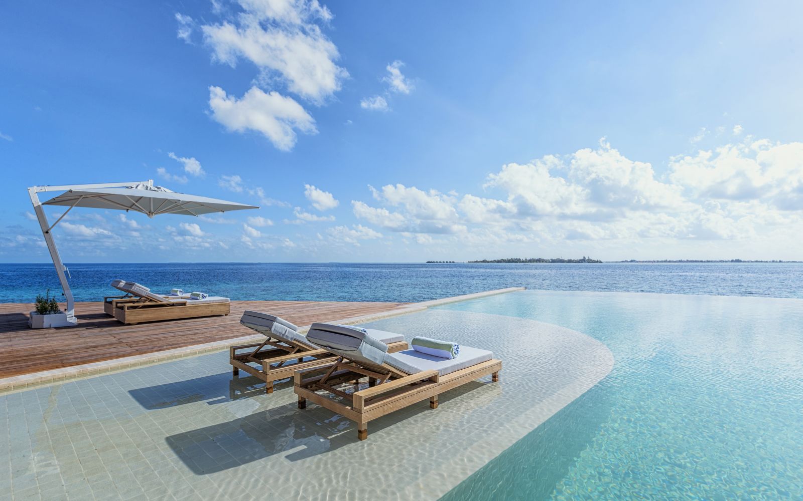 Infinity pool facing the Indian Ocean at Kudadoo Maldives Private Island