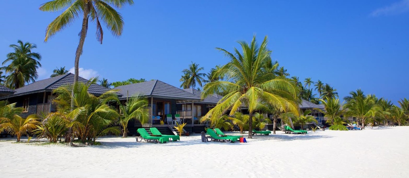 The beach villas at Kuredu Resort and Spa Maldives