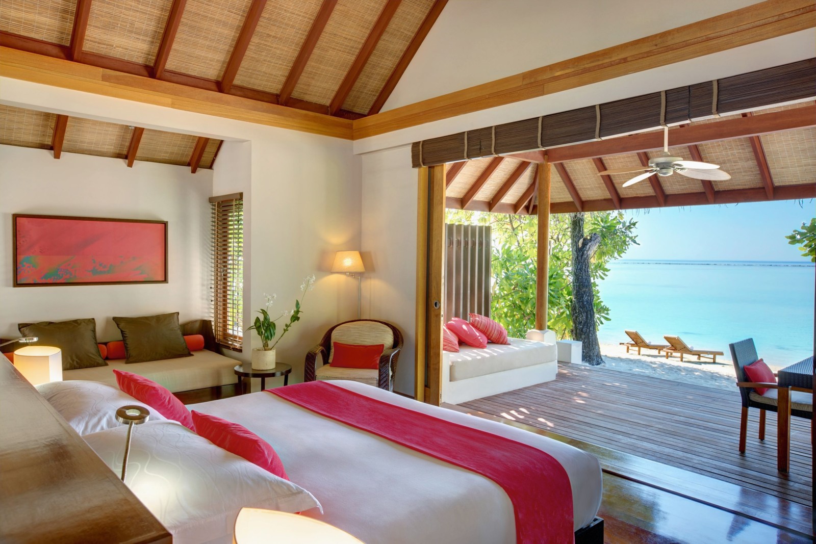 Double bedroom of a Beach Villa in LUX Maldives