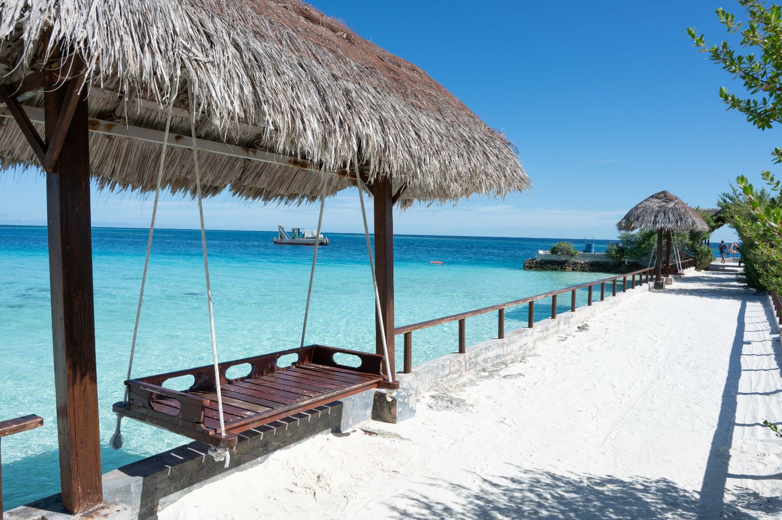 Swing on the concourse overlooking the ocean at Maunudu Island resort in the Maldives