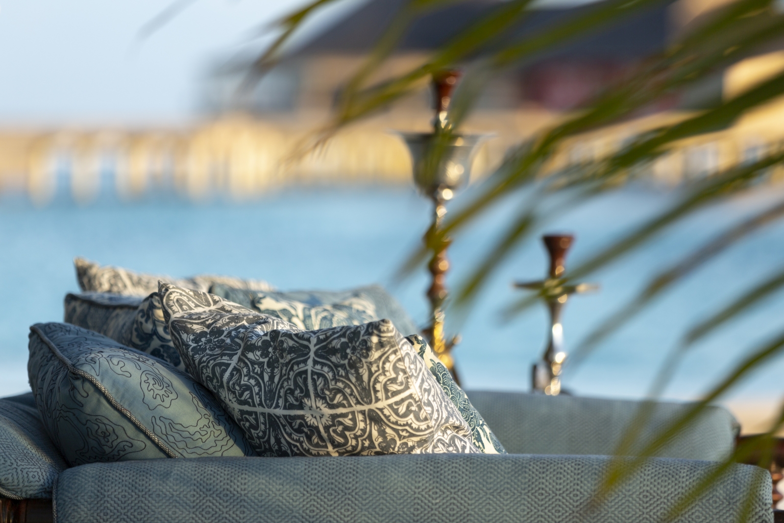 Comfortable seating with views over the Indian Ocean at luxury resort Naladhu in the Maldives